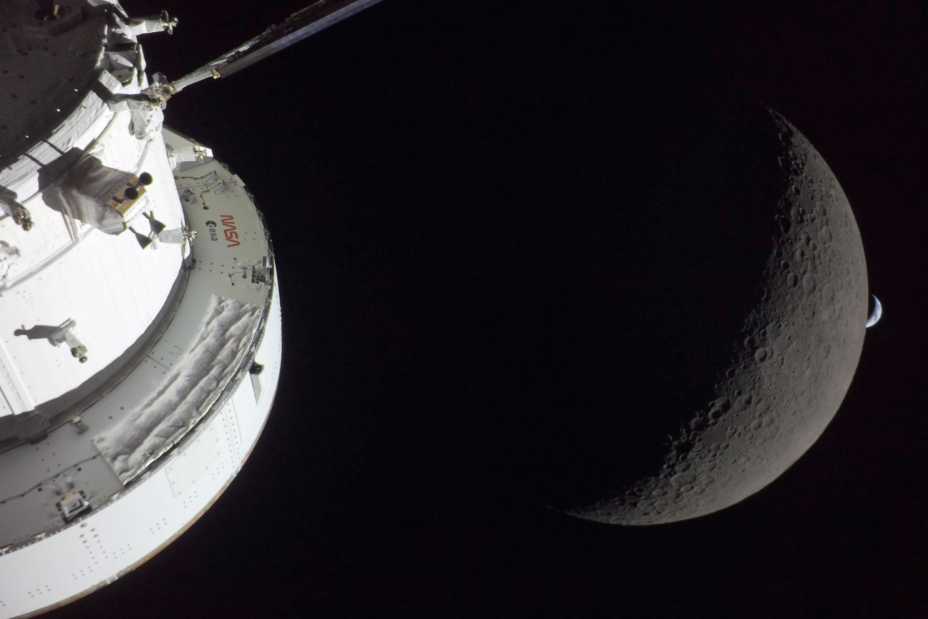 Artemis Orion spacecraft with Moon and Earth